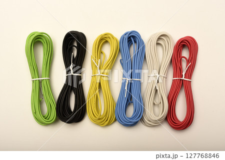 Coils of multicolored wires. Connecting wires for electronics. Coils of multicolored wires. Connecting wires for electronics. 127768846