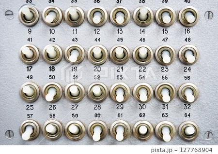 Mechanical switches on an old electrical device 127768904