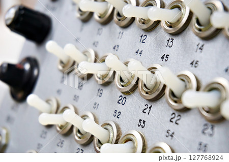 Mechanical switches on an old electrical device Mechanical switches on an old electrical device 127768924