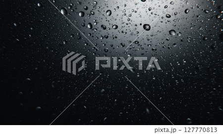 Raindrops on darkened surface neural network AI generated 127770813