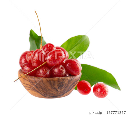 Elaeagnus multiflora isolated on white background. Cherry elaeagnus or cherry silverberry in wooden bowl. Goumi or gumi berry. 127771257