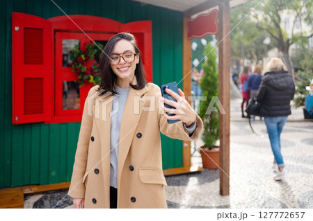 Portrait of positive woman 30s in glasses laughing Portrait of positive woman 30s in glasses laughing 127772657