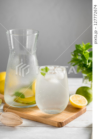 Lemonade with lemons, limes and fresh mint. Homemade lemonade summer drink 127772674