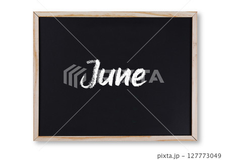 June word in chalk on chalkboard 127773049