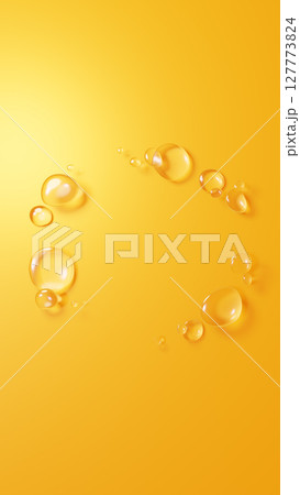 黄色背景に複数の水滴の背景素材。3D（縦長） 127773824