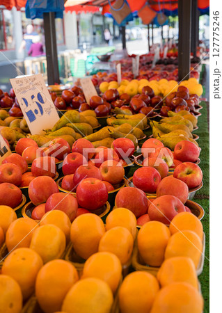 Fresh red apples, outdoor fruit farm market 127775246