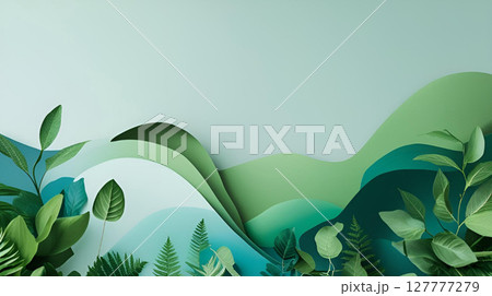 green leaves frame on pastel blue background 127777279
