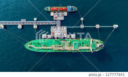 Aerial view lpg tanker ship vessel loading and unloading in oil terminal refinery, Global business import export logistic transport sea freight cargo lpg tanker ship, LPG tanker ship at port, Aerial view lpg tanker ship vessel loading and unloading in oil terminal refinery, Global business import export logistic transport sea freight cargo lpg tanker ship, LPG tanker ship at port, 127777841