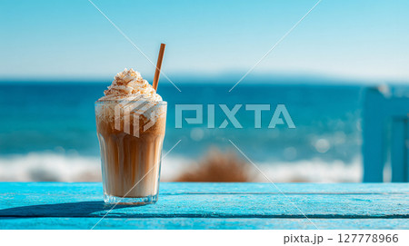 海の見えるお洒落なカフェのアイスコーヒー　AI画像 127778966
