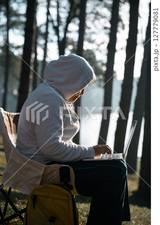 Future remote work combines technology nature smart phone enable e-learning productivity while traveling blending comfort modern devices serenity computer equipment business connection natural world Future remote work combines technology nature smart phone enable e-learning productivity while traveling blending comfort modern devices serenity computer equipment business connection natural world 127779081