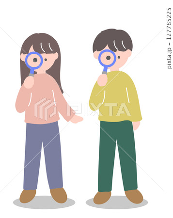 虫眼鏡を覗く若い男女カップル 虫眼鏡を覗く若い男女カップル 127785225