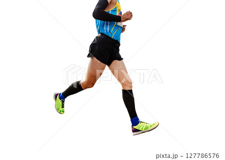 athlete runner in compression socks and sleeves running marathon isolated on white background athlete runner in compression socks and sleeves running marathon isolated on white background 127786576