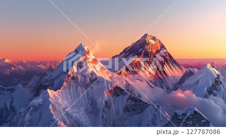 Sunset at Mount Everest reveals vibrant orange and pink hues over the breathtaking Himalayan peaks. Sunset at Mount Everest reveals vibrant orange and pink hues over the breathtaking Himalayan peaks. 127787086