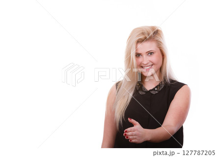 Woman with open hand ready for handshake Woman with open hand ready for handshake 127787205