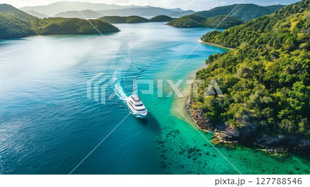Cruise vibrant tropical coastlines, discover hidden coves, and enjoy sunsets, clear waters, and marine life. 127788546