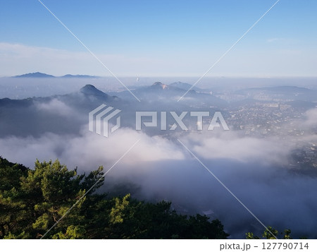green mountain slope with mountain green mountain slope with mountain 127790714