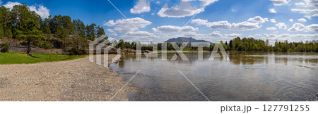View of Love Stone over the Biya River with the town of Turochak on the opposite bank. Concept of serenity, connection, and sacred places in wild Russian nature 127791255