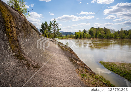 Lava rock formation known as the Love Stone on the bank of the Biya River in Altai, Russia. Concept of sacred natural landmarks and emotional symbolism in wild nature 127791268