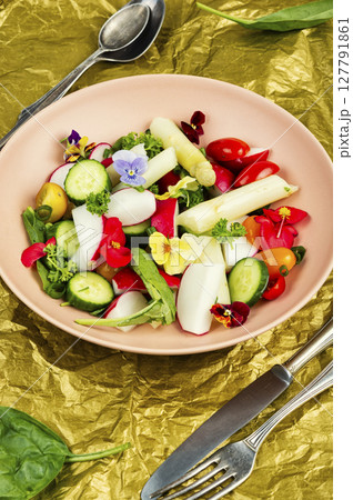 Asparagus salad with flowers. 127791861