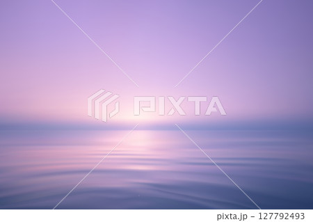 Dreamy ocean scene with soft pink purple sunrise Dreamy ocean scene with soft pink purple sunrise 127792493