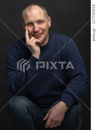 Happy man with sweatshirt studio portrait Happy man with sweatshirt studio portrait 127793058