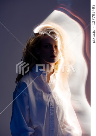 Abstract woman studio portrait with light painting technique Abstract woman studio portrait with light painting technique 127793495