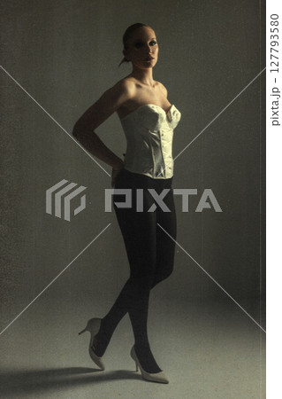 Beautiful dark woman portrait full body silhouette in grunge retro vintage style Beautiful dark woman portrait full body silhouette in grunge retro vintage style 127793580