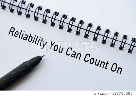 Reliability You Can Count On on notebook with pen representing assurance and trust 127793598
