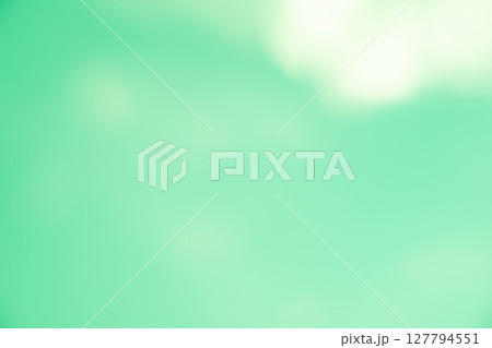 イエローグリーンカラーに白の背景素材 127794551