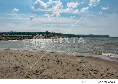 Baikal lake sand beach, Olkhon island. Summer natural landscape. 127795284