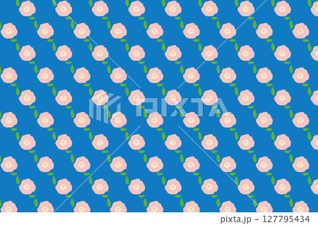 ピンクの丸い花と青背景のパターン素材 127795434