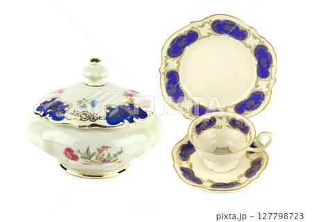 Vintage porcelain candy bowl ,cup and saucer isolated on white. Collage. Vintage porcelain candy bowl ,cup and saucer isolated on white. Collage. 127798723