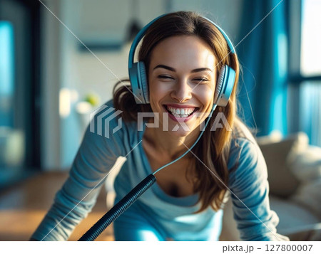 happy young woman enjoying music in living room happy young woman enjoying music in living room 127800007