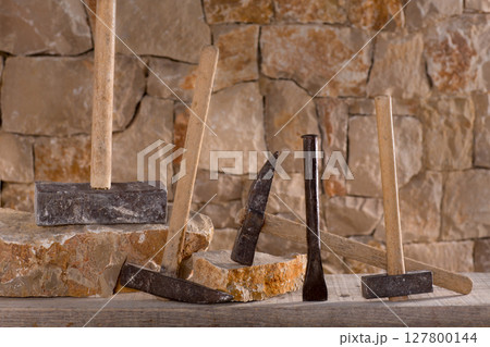 Hammer tools of stonecutter masonry work Hammer tools of stonecutter masonry work 127800144