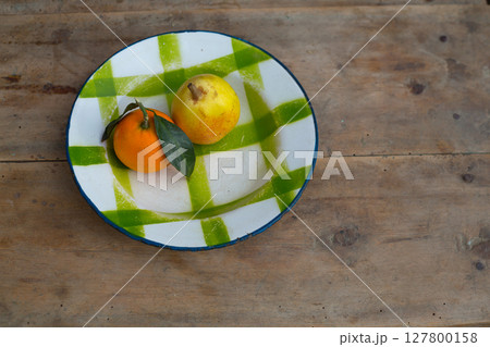 fruits tangerine and pear in vintage porcelain dish plate retro fruits tangerine and pear in vintage porcelain dish plate retro 127800158