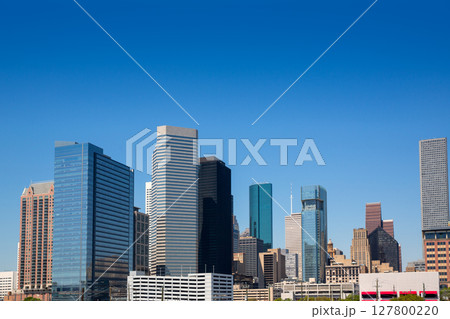Houston downtown skyscrappers skyline on blue sky Houston downtown skyscrappers skyline on blue sky 127800220