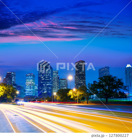 Houston Texas skyline at sunset with traffic lights Houston Texas skyline at sunset with traffic lights 127800227