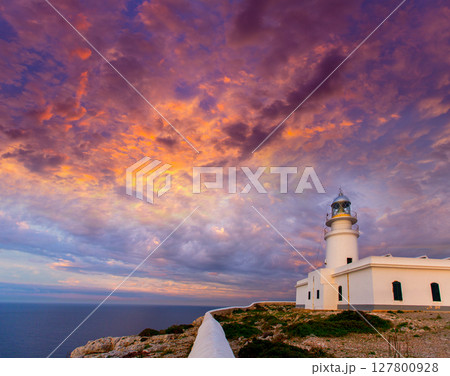 Menorca sunset at Faro de Caballeria Lighthouse 127800928