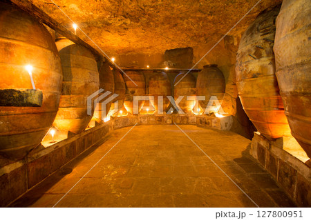Antique winery in Spain with clay amphora pots 127800951