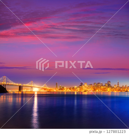 San Francisco sunset skyline California bay water reflection San Francisco sunset skyline California bay water reflection 127801223