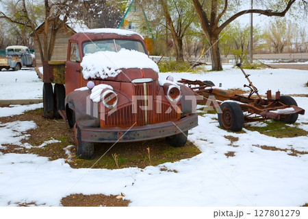 Snow old truck in the early spring time in Nevada 127801279