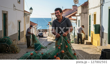Happy Fisherman Repairing Nets in a Coastal Village Street Near the Sea 127802501