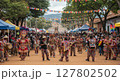 Colorful Cultural Parade with Traditional Costumes at a Latin American Festival 127802502
