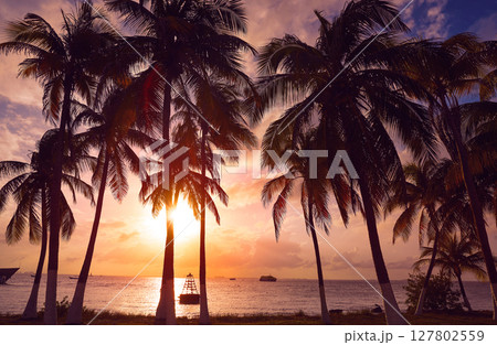 Isla Mujeres island Caribbean beach sunset 127802559