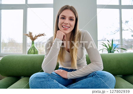 Web cam view of young woman talking looking in camera, online meeting, video call Web cam view of young woman talking looking in camera, online meeting, video call 127802939