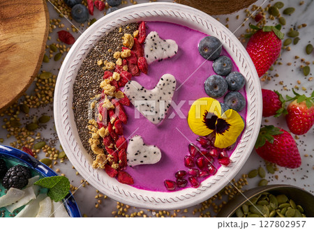 Acai bowl smoothie pitaya hearts blueberry goji Acai bowl smoothie pitaya hearts blueberry goji 127802957