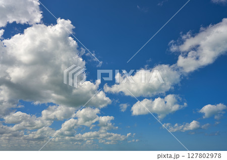 Blue summer sky white cumulus clouds Blue summer sky white cumulus clouds 127802978