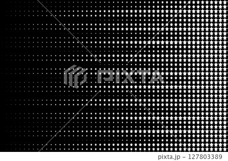 Abstract background with star-shaped halftone dots creating a gradient transition in black and white tones. 127803389