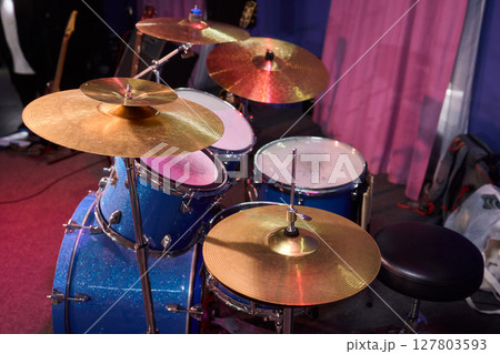 Dynamic and Engaging Drumming Session Featuring a Complete Drum Set and Beautiful Cymbals Dynamic and Engaging Drumming Session Featuring a Complete Drum Set and Beautiful Cymbals 127803593