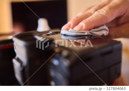 Cleaning and maintaining a DSLR camera is essential for ensuring optimal performance and longevity Cleaning and maintaining a DSLR camera is essential for ensuring optimal performance and longevity 127804063